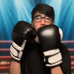 Man in boxing gloves ready to fight