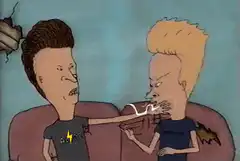 Beavis and Butt-Head arguing on couch