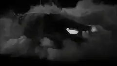 Car drifting in thick smoke at night