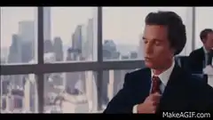 Gordon Gekko adjusting his tie
