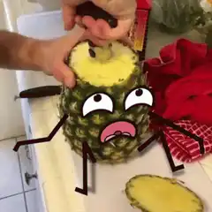 Pineapple being cored with cartoon face
