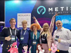 Group posing at Metis Layer 2 event with animated stickers