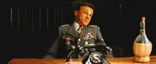 Hitler shrugs at the bottle