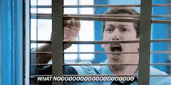 Andy Dwyer screaming through window blinds