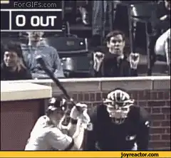 Baseball fan makes heart hands during strikeout