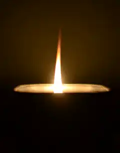 Candle flame with smoke ring