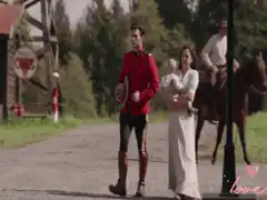 Royal Canadian Mounted Police couple walking with baby
