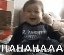 Baby laughing hysterically and falling over