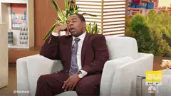 Kenan Thompson bored on talk show