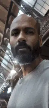 Men and women posing for selfies