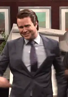 Colin Firth dancing and pointing