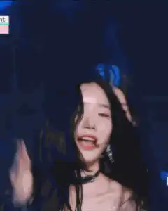Wonyoung waving and smiling