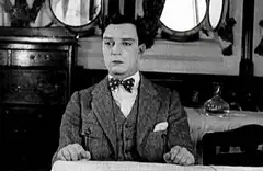 Buster Keaton clapping slowly