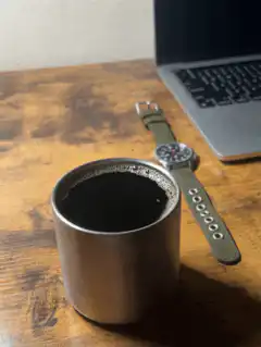 coffee cup on wooden desk