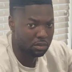 Man looking down then up with wide eyes