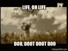 Woman singing in car LIFE OH LIFE DOO DOOT DOOT DOO