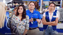 Store employees taking a photo