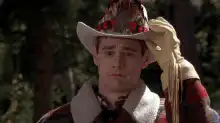 Jim Carrey takes off cowboy hat