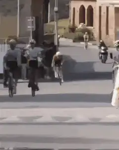 Cyclists celebrating with Bitcoin heads