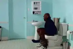 Man flies off toilet in bathroom