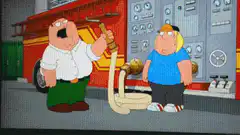 Peter Griffin gets sprayed by fire hose