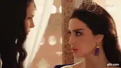 Queen looks down in disappointment