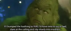 The Grinch staring into madness