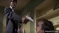 Jules Winnfield points gun at Brett