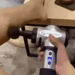 Cat hugging massage gun