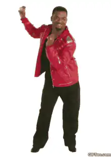 Will Smith dancing in red jacket