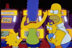 Marge plays slots while Homer holds Maggie and Bart