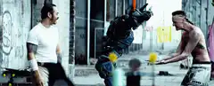 RoboCop fights two men in alley