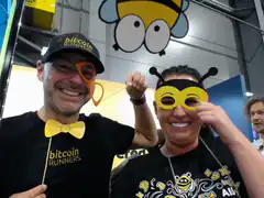 Bitcoin Runners couple with bee masks
