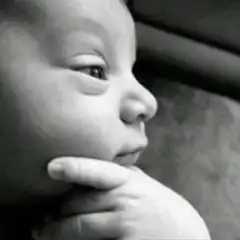 Baby and cat thinking