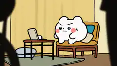 Cloud character eating popcorn on couch