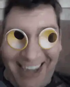 Man with googly eyes filter