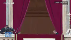 Pope Francis waves from balcony