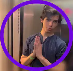 Man in elevator with prayer hands and finger