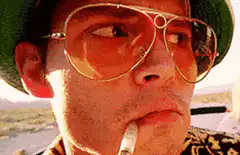 Jesse Pinkman smoking and looking around