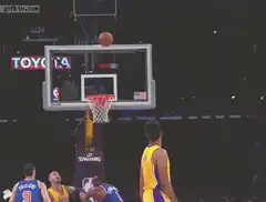 Lakers player celebrates near hoop