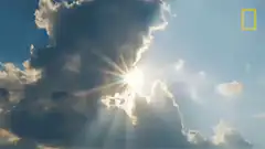Sun shining through clouds