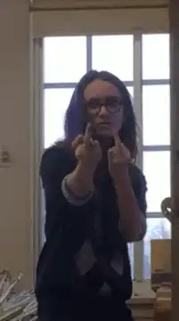 Girl giving double middle finger