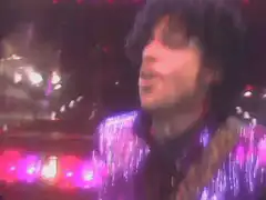 Prince singing on stage