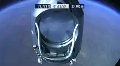 Space capsule floating in orbit