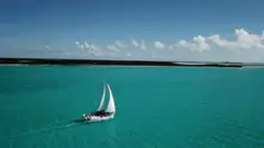 Sailboat on turquoise water