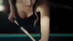 woman playing pool with bitcoin logo