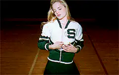 Woman unzips jacket with lightning effect