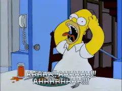 Homer Simpson screaming at dinner