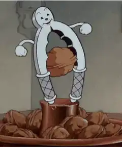 Mr. Peanut cracking a walnut