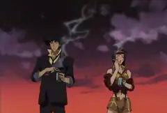 Spike and Faye smoking against sunset